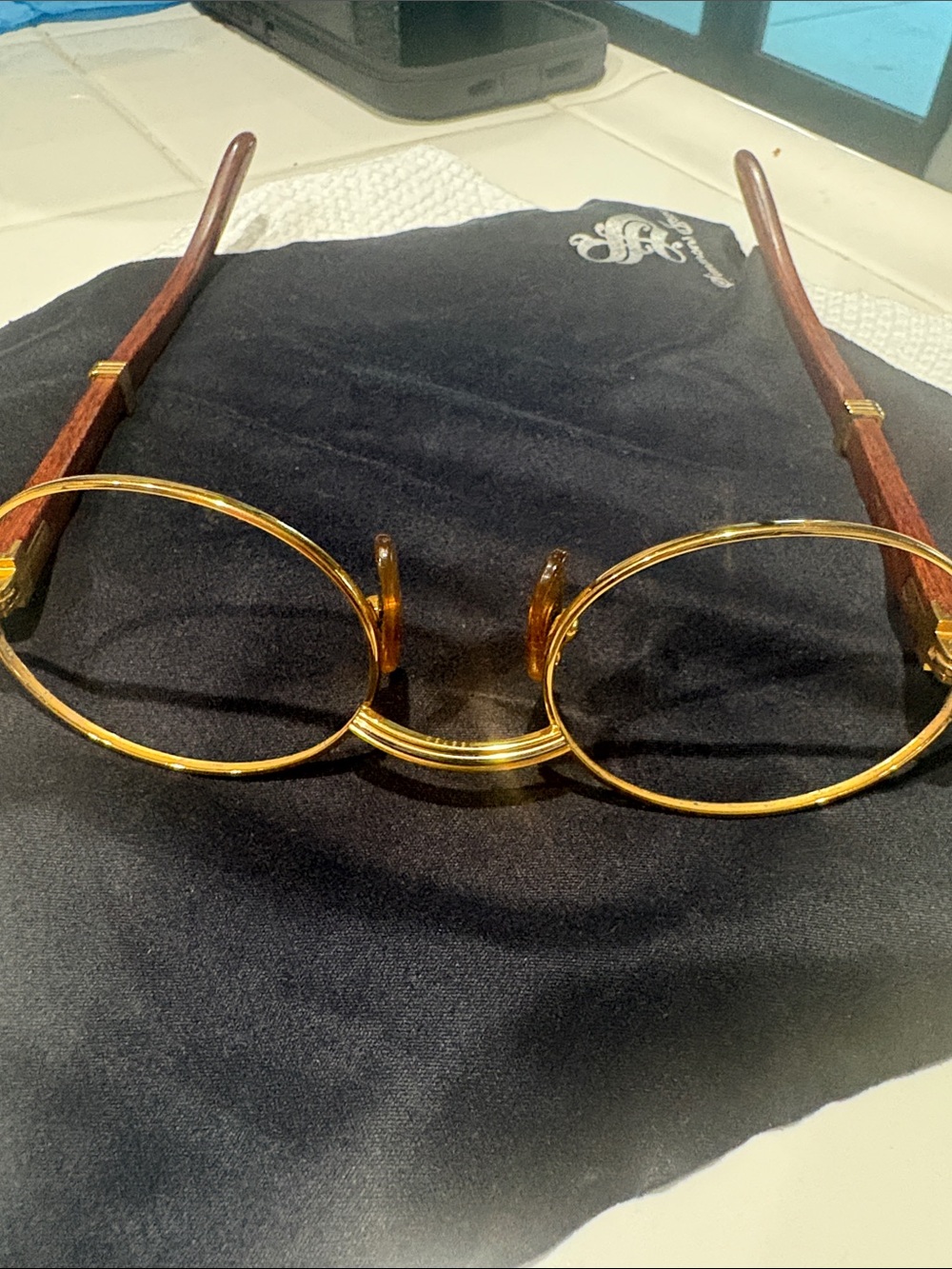 Cartier Gold Round Metal Frame Glasses with Wood-Effect Temples Cartier Authenti